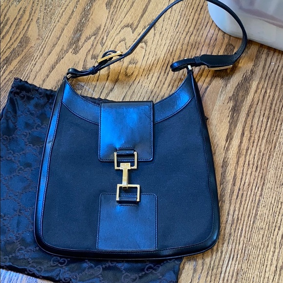 Gucci Handbags - Gucci black cloth shoulder bag with leather trim.